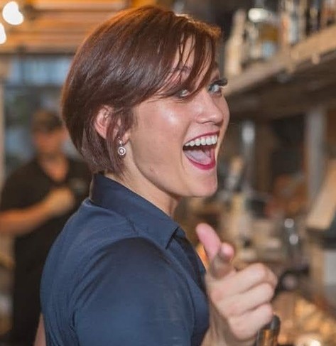 Portrait of Michelle Flannery, co-founder and lead bartender